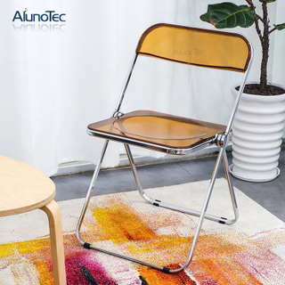 Chaises en plastique pliables transparentes de mobilier d'extérieur simple